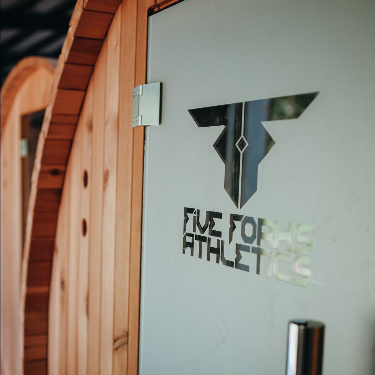 A door that says five force athletics on it