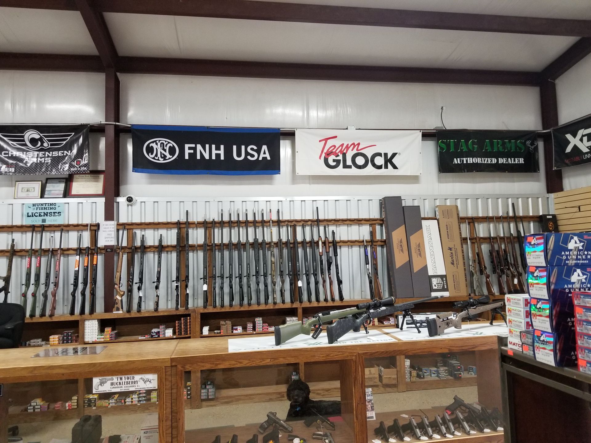 A store filled with lots of items and a yellow flag that says liberty