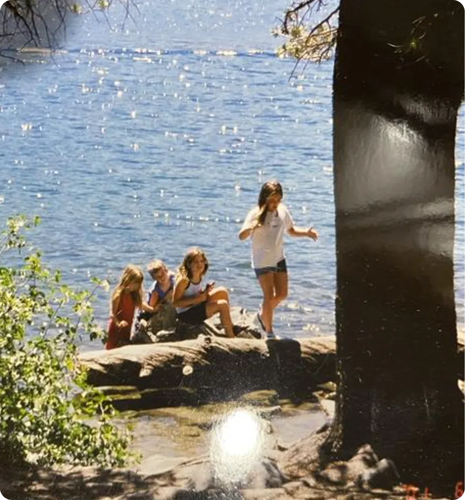 People beside a lake