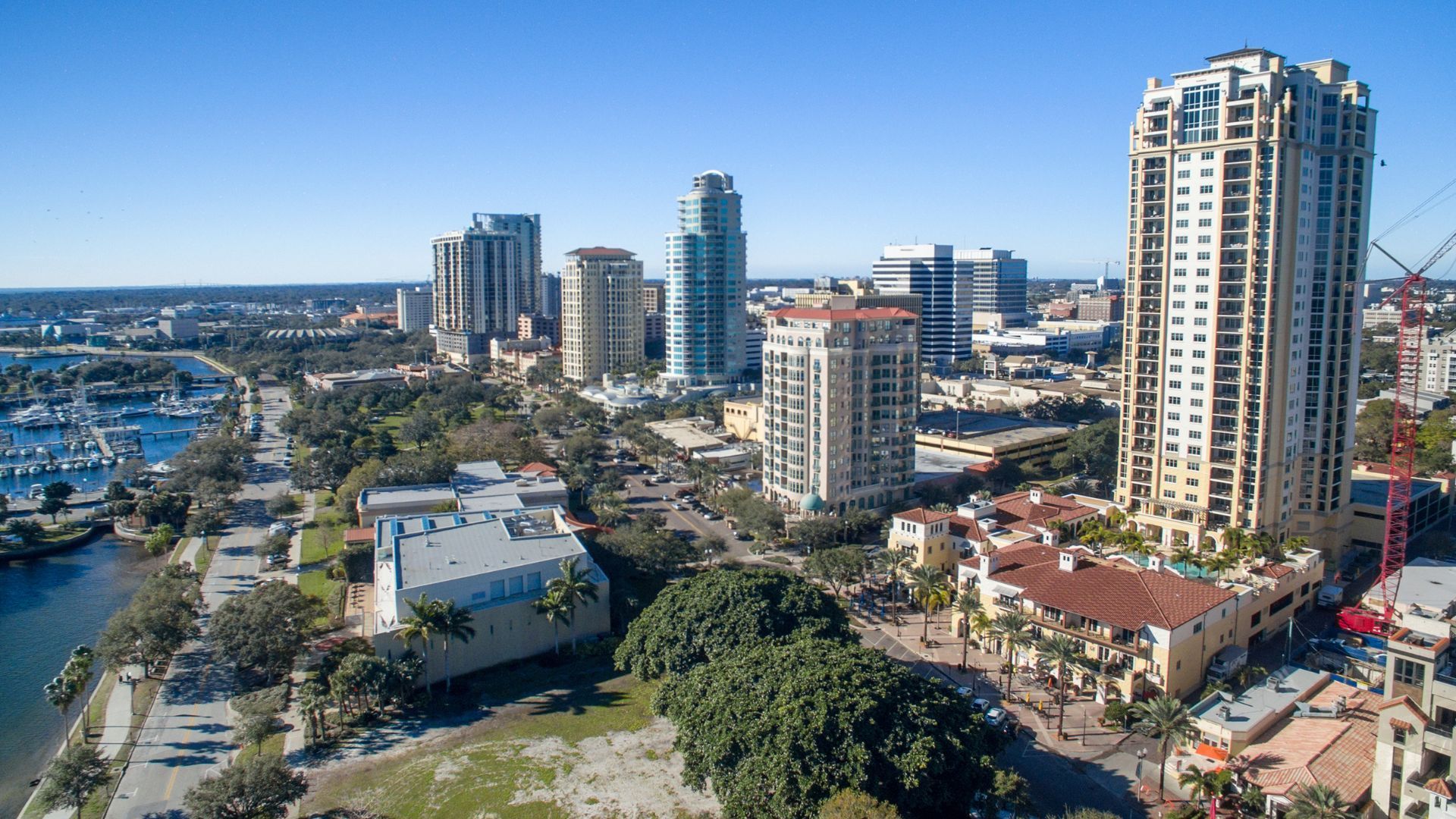 An aerial view of a city with a lot of buildings and trees.