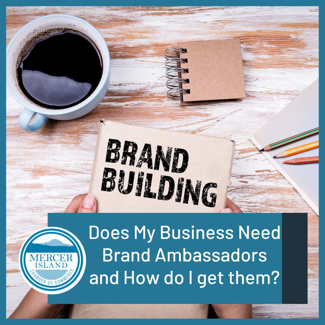 cup of coffee and three brown notebooks with one titled brand building