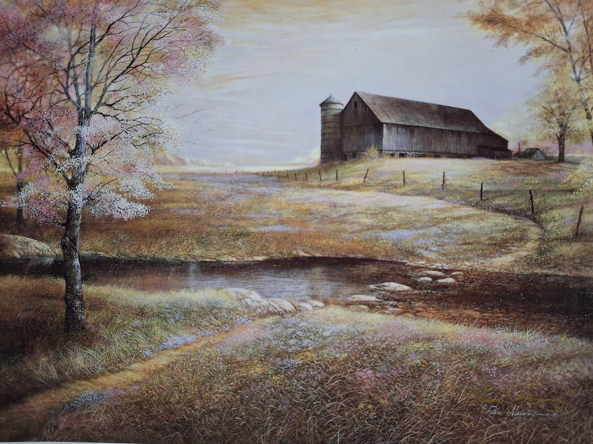 A painting of a barn resting on a hilltop in the spring.
