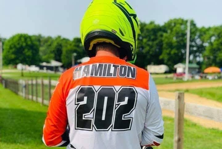 Person in racing jersey with 
