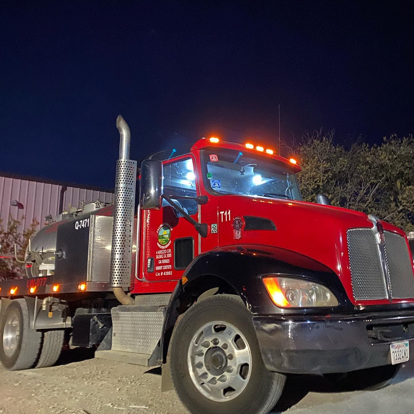 A red truck with the number 111 on the front