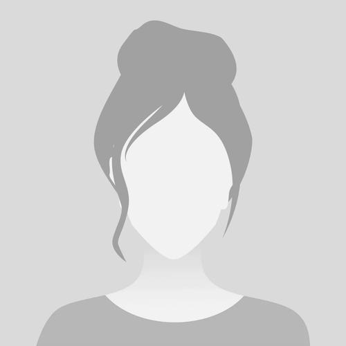 Silhouette of a person in a suit and tie, shown as a generic profile icon