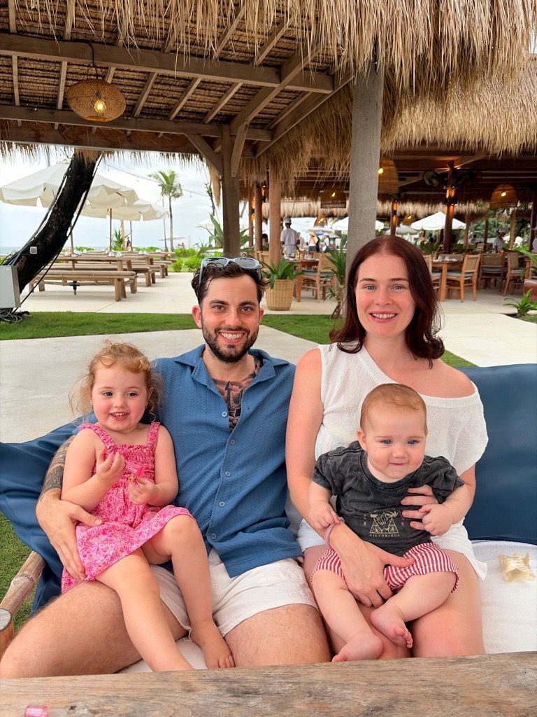 Emily and family enjoying a holiday