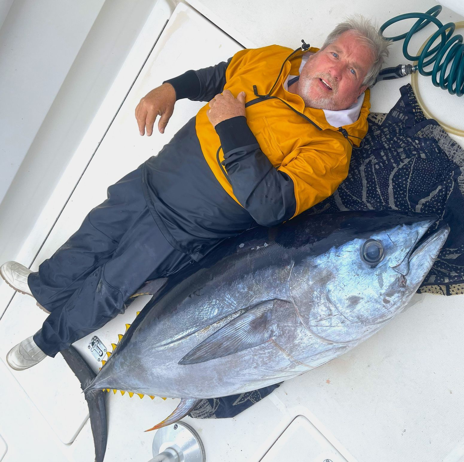 Laying down on the job with a bluefin tuna