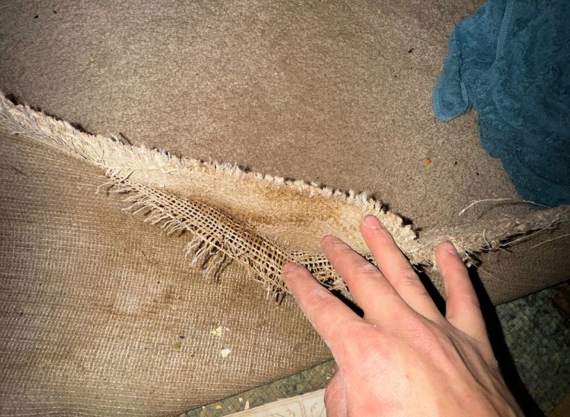 carpet delaminating in bedroom