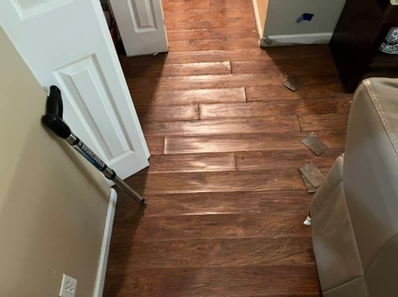 water damaged floor in a fulton, mo apartment
