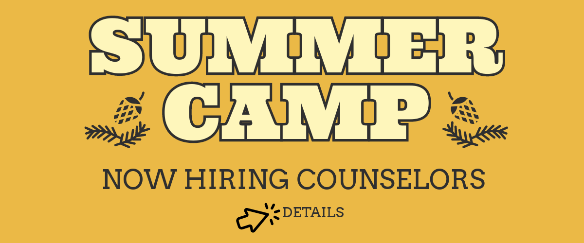 A yellow sign that says summer camp now hiring counselors