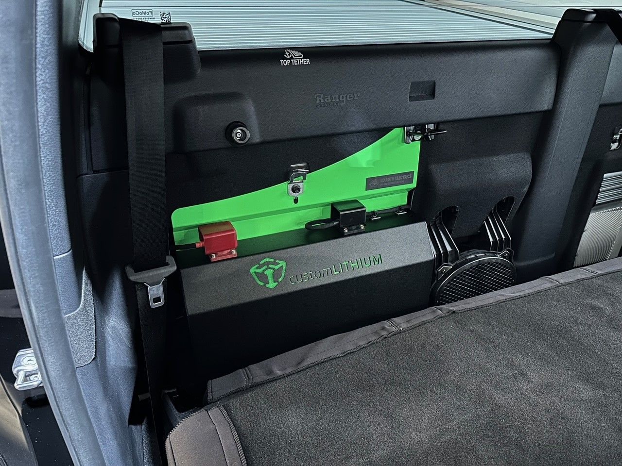 Ford Ranger rear seat dual battery setup with Custom Lithium system for 4WD touring and off-grid power.
