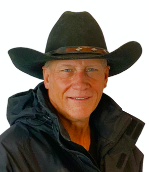 A man wearing a cowboy hat and a black jacket