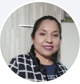 A woman in a plaid shirt is smiling in a circle.
