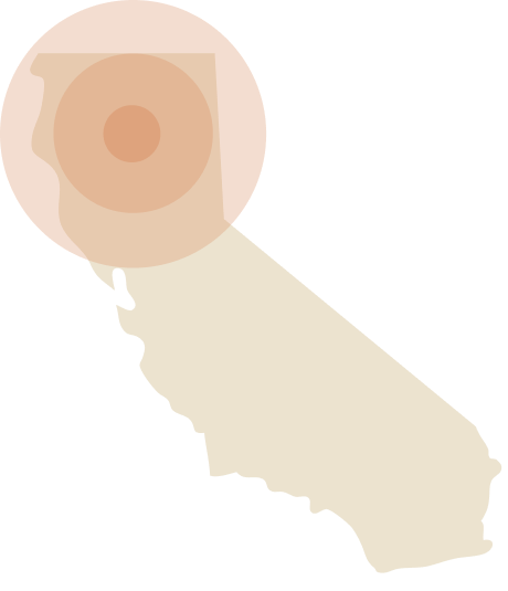 California map with an orange target marker near the northern coast