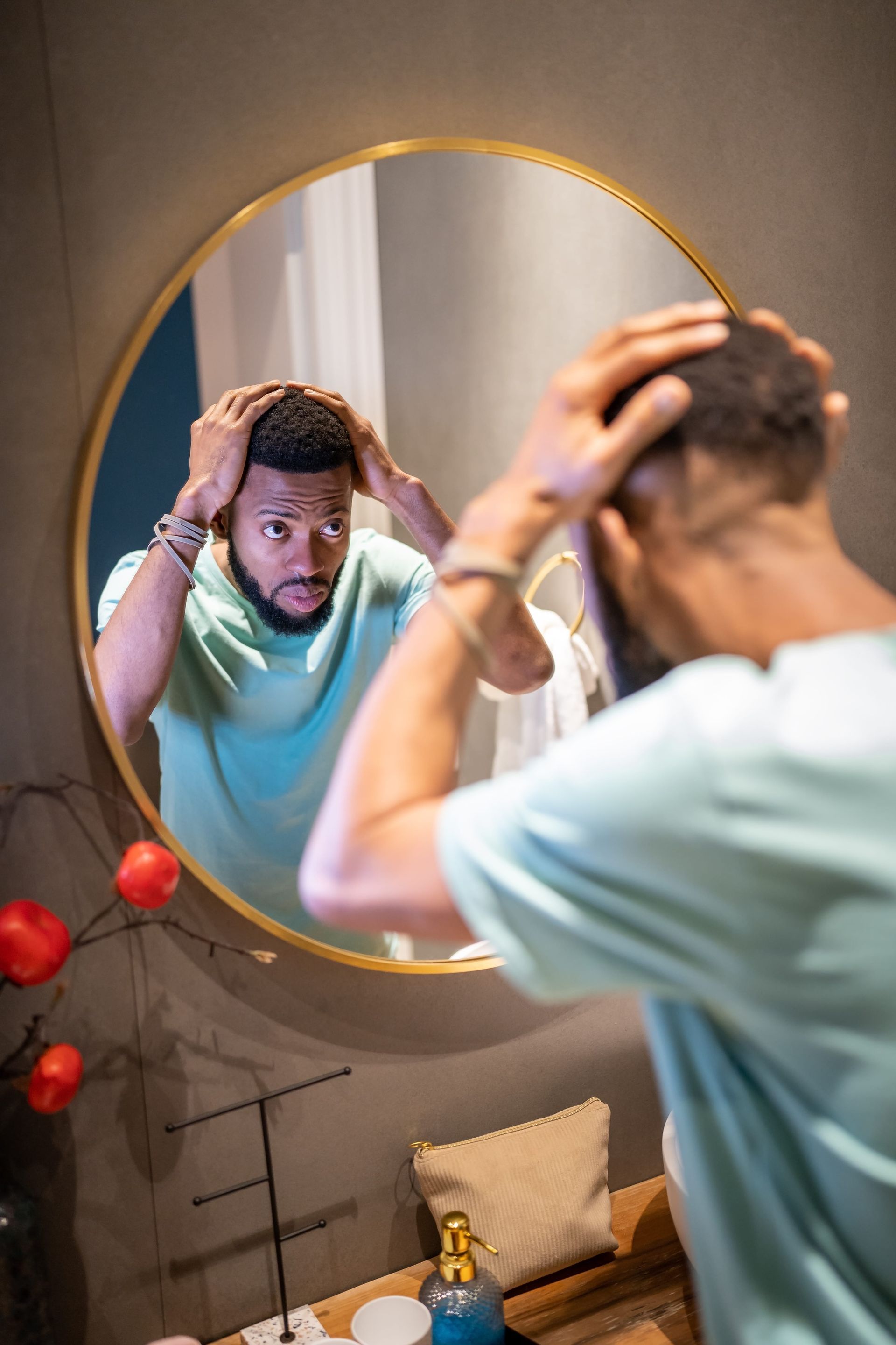 Man overcoming negative self-image and building confidence - therapy guidance from Coco Counseling