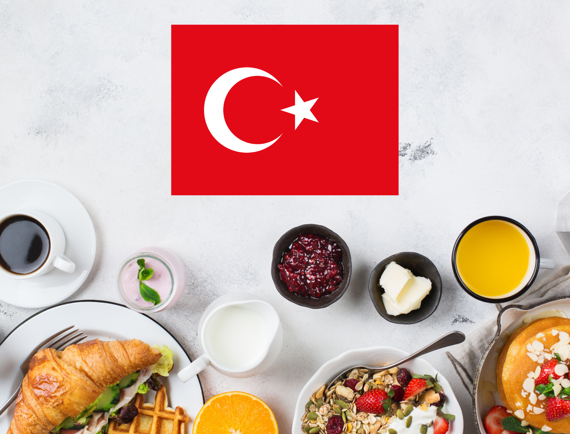 Turkish flag above a top-down breakfast spread with coffee, pastries, fruit, and jam
