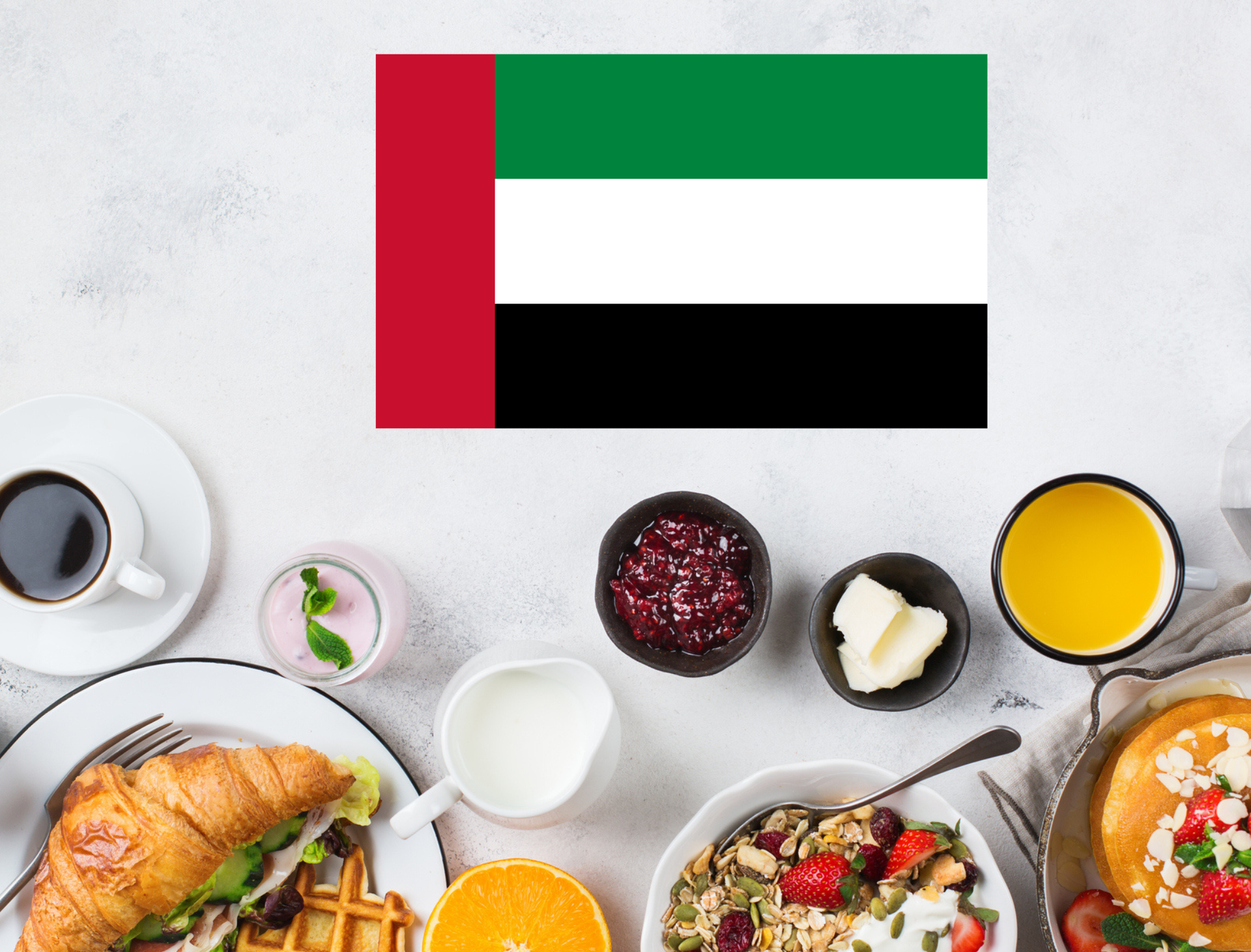 United Arab Emirates flag above a table with breakfast foods and coffee