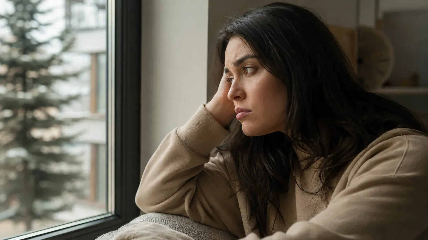 Woman in therapy illustrating what are the first signs of PTSD after a traumatic event.