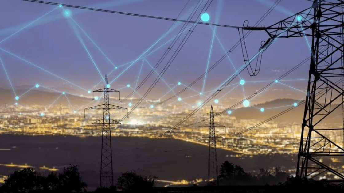 High-voltage power lines and towers over a city at dusk, overlaid with a glowing digital network connection graphic.