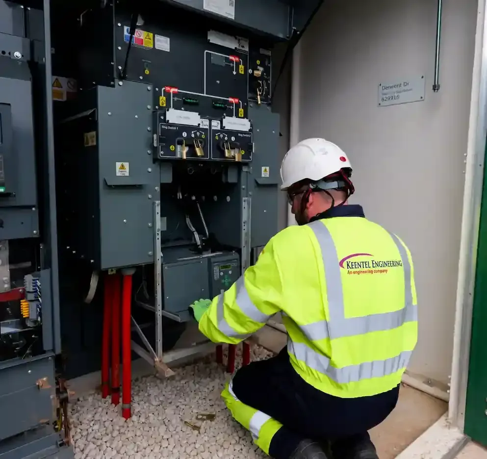 Substation engineer reviewing field equipment changes for FAC-008 ratings change control