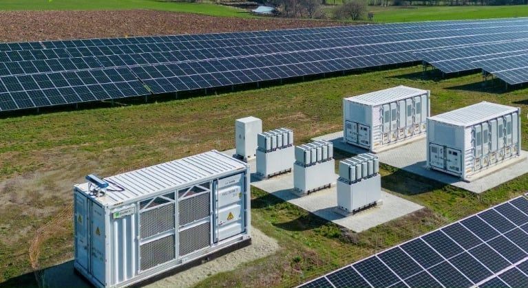 Data center UPS power management and server racks representing large electronic load interconnection requirements