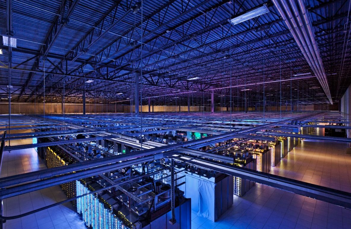 Blog banner showing data centers, utility-scale battery storage, and power transmission infrastructure with growth analytics representing large-load impacts on the U.S. power grid in 2026.