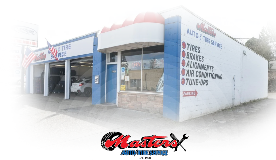 Auto Repair in Seattle, WA | Outside of our shop with logo | Masters Auto & Tire