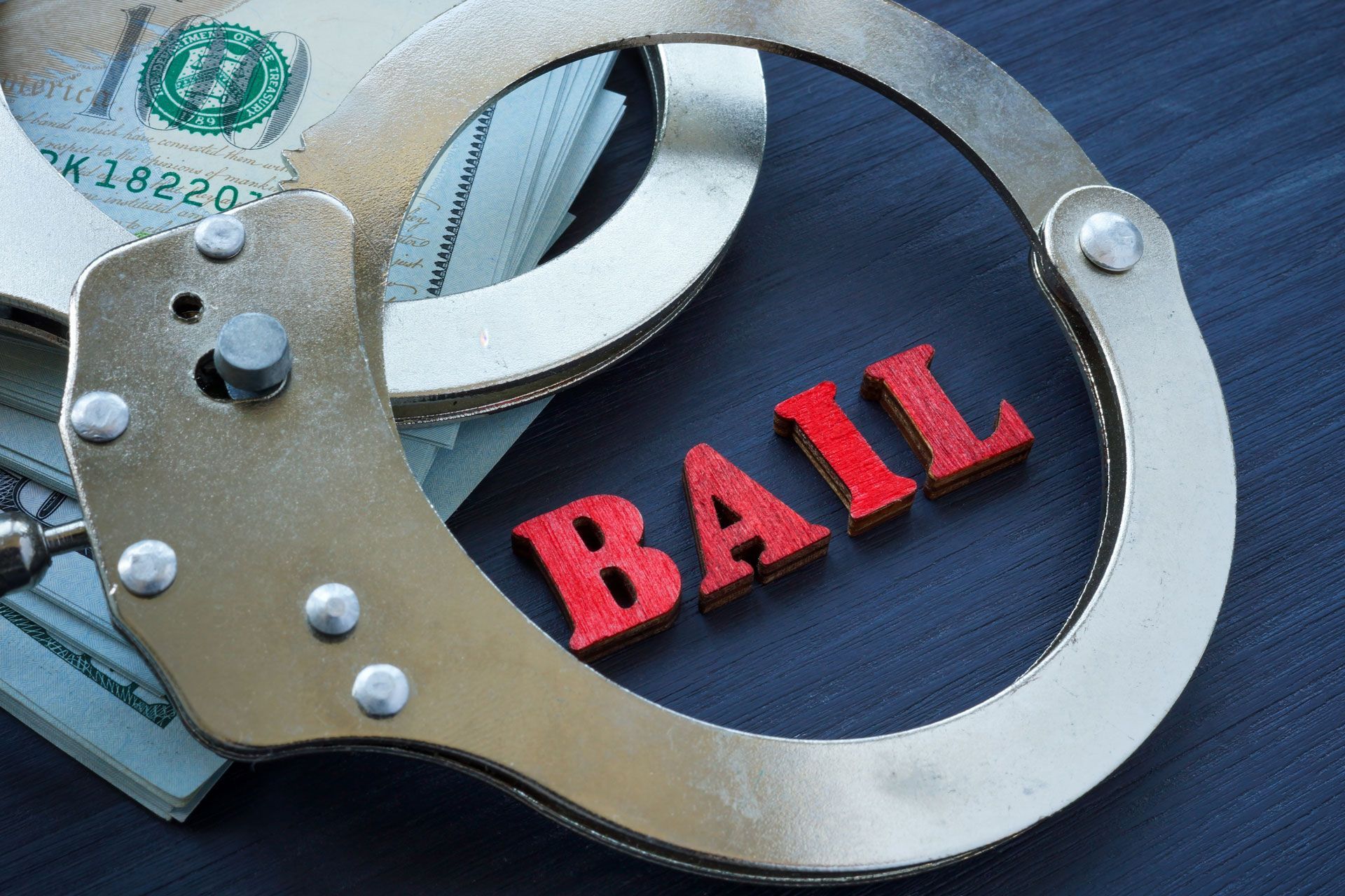 A clipboard with bail bonds written on it