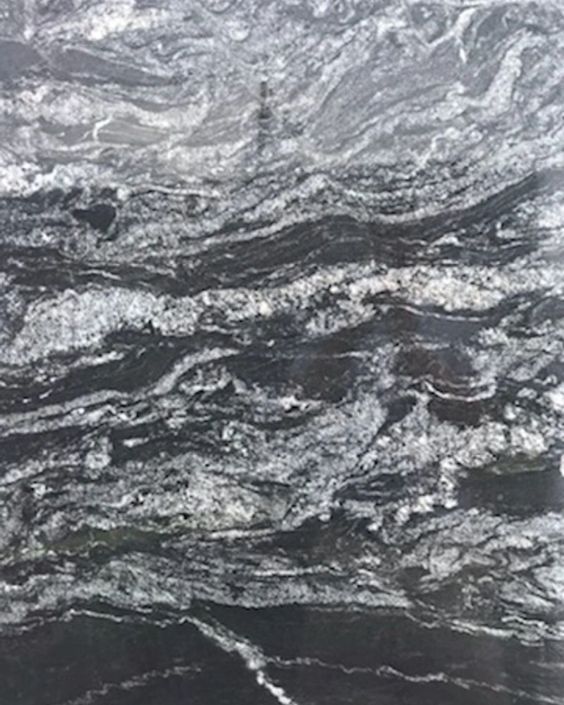 Gray and black marbled stone texture with wavy white veins