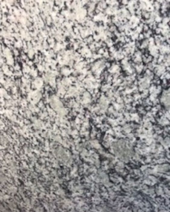 Close-up of speckled gray and white stone texture