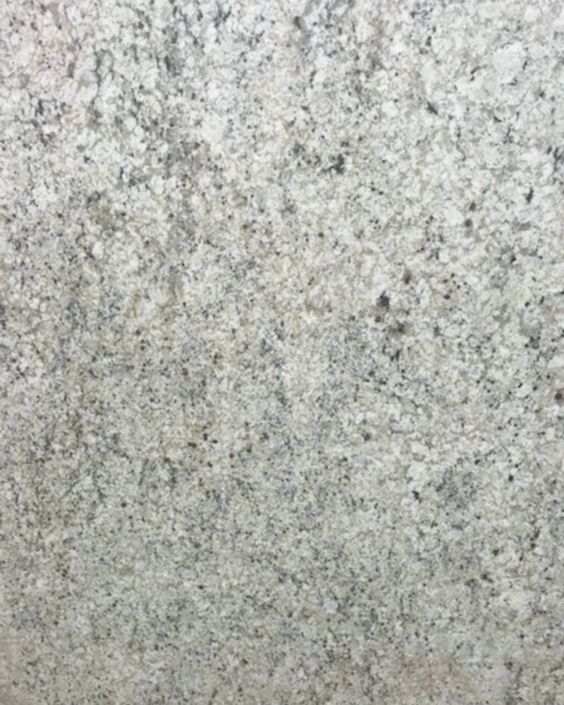 Close-up of light gray speckled stone or granite texture