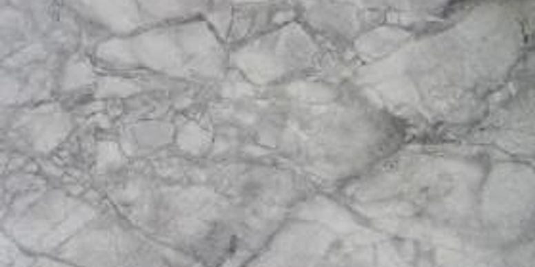 Light gray marble surface with subtle white veining
