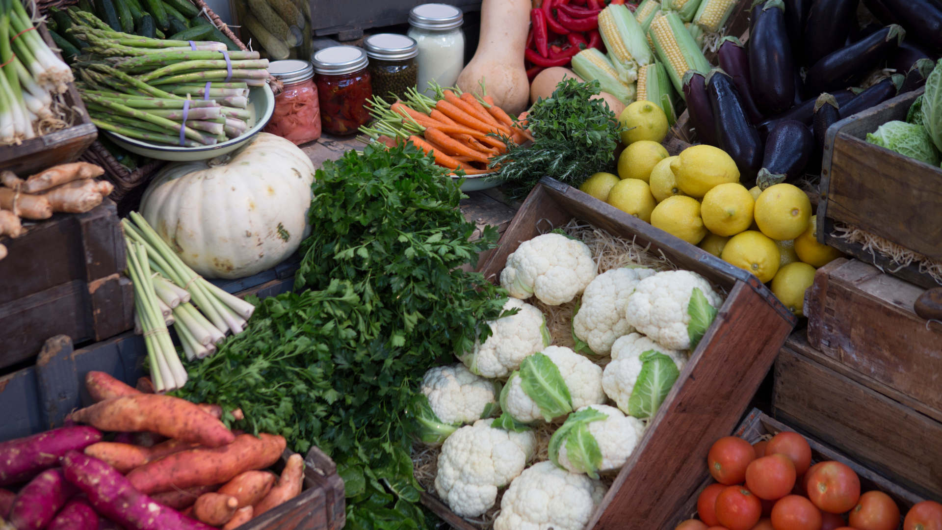 There are many different types of vegetables on the table.