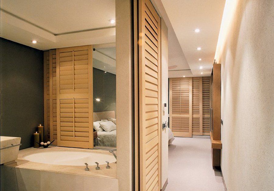 wooden shutters in bedroom