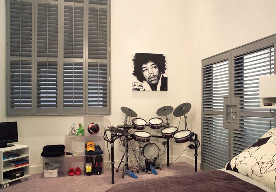grey shutters in bedroom