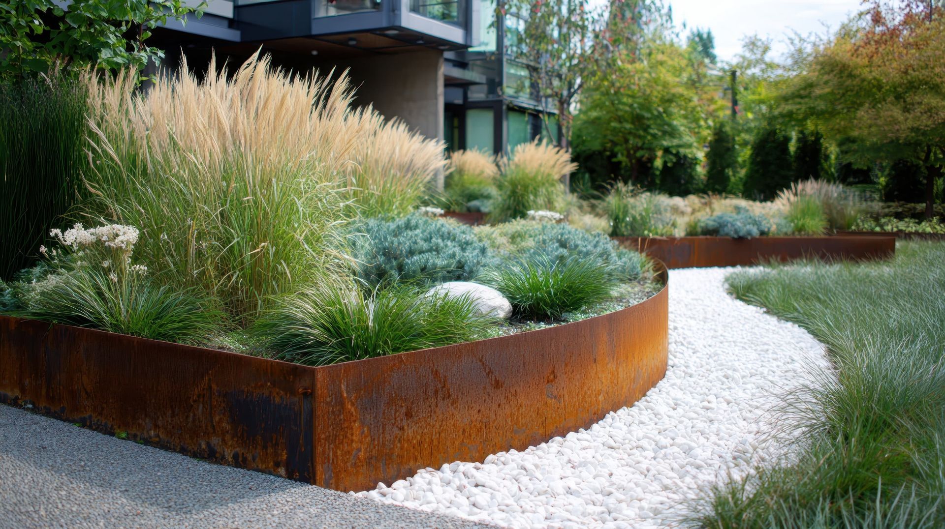 a garden with steel edging and grass