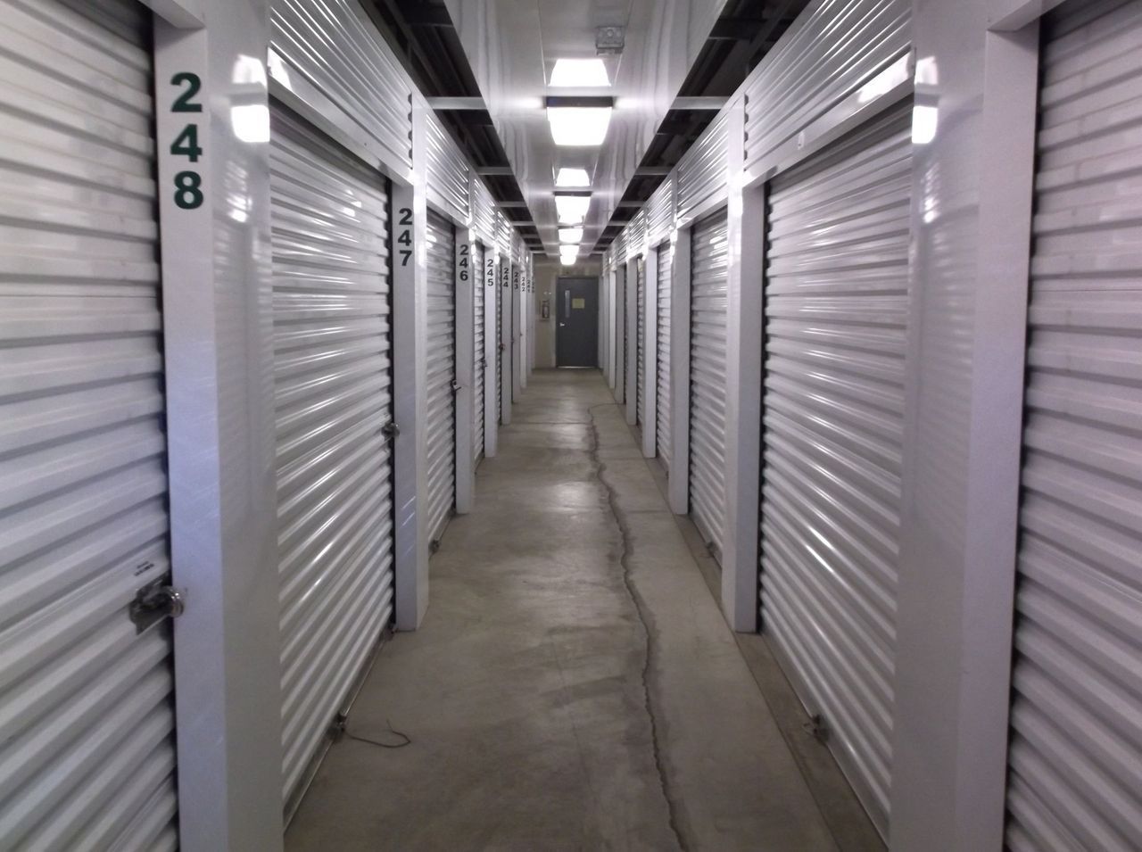 A row of storage units with the number 248 on the door – Springfield, OR - 42nd St Mini Storage