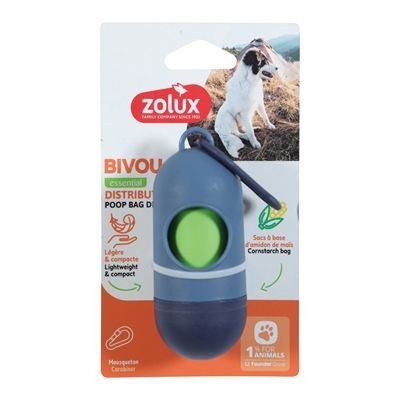 Blauwe en groene Zolux poepzakjesdispenser op de winkelverpakking, met een afbeelding van een hond en een rood logo.