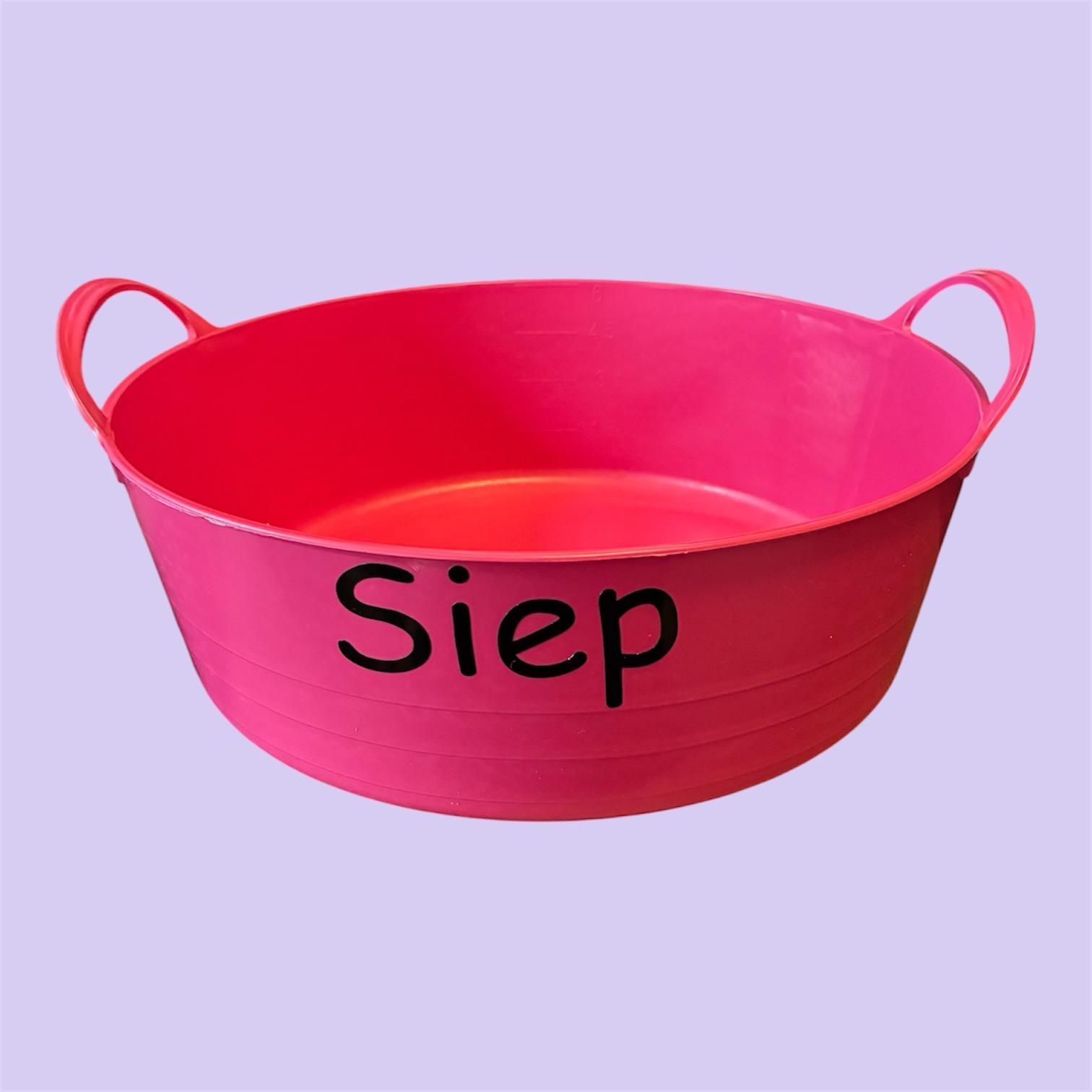 Roze waskom met handvat, opschrift