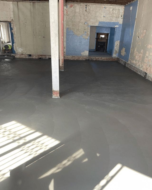 A Room With A Concrete Floor And A Pillar In The Middle Of It — Tuncote Concrete Constructions in Salamander Bay, NSW