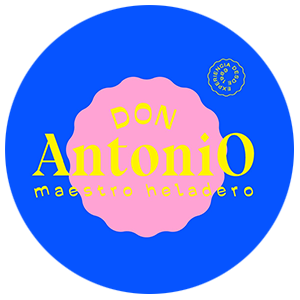 Logotipo circular azul con centro rosa que dice “Don Antonio” y “maestro heladero” en amarillo.