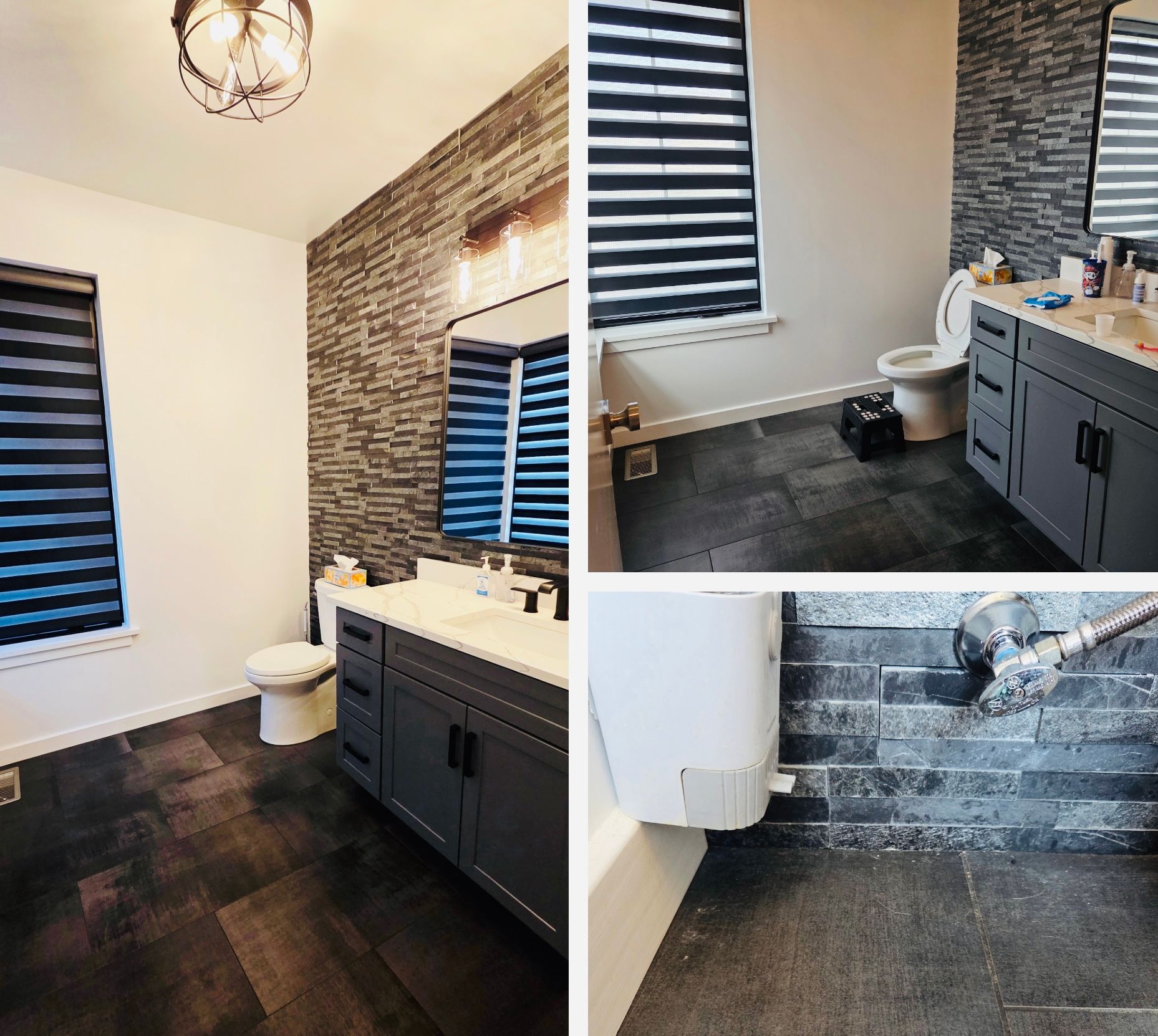 Modern bathroom with dark vanity, white sink, striped blinds, and dark tile floor