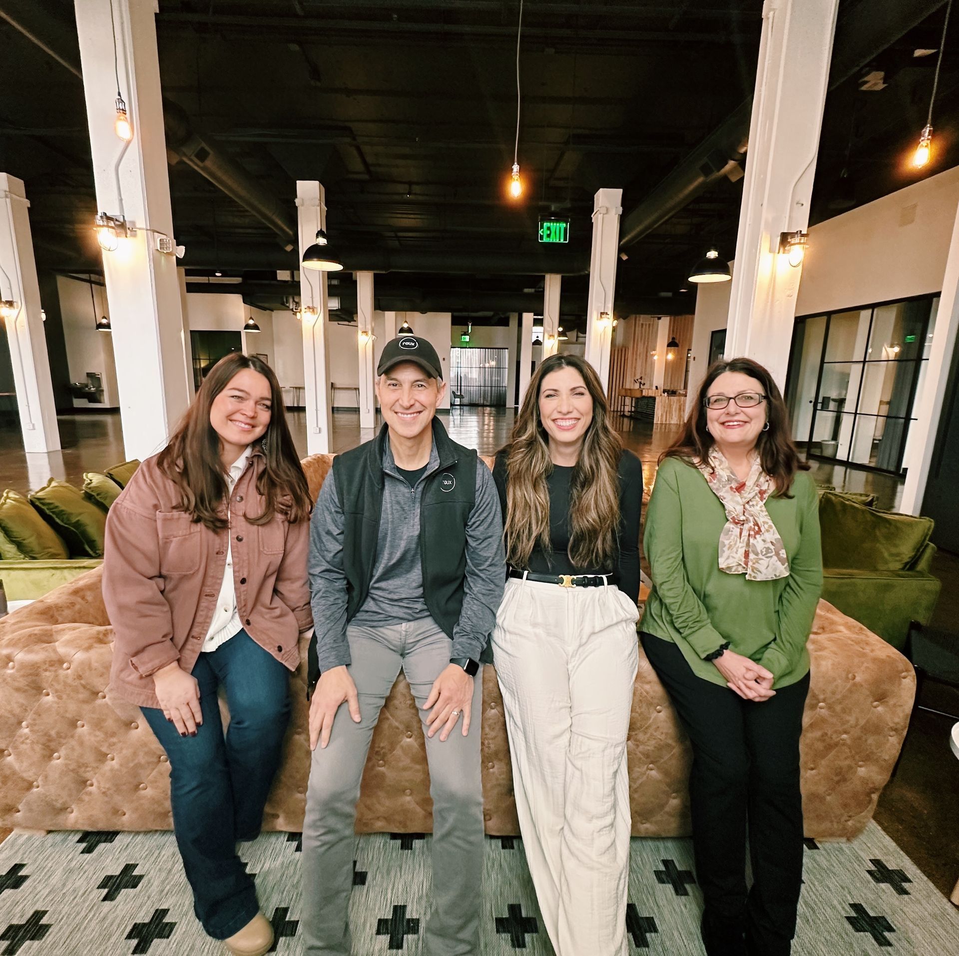 Lauren, Stefan, Lianna and Karen sit together on a couch | Roux LLC Franklin, TN