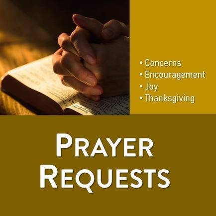 A person is praying with their hands folded over a bible. Prayer Requests