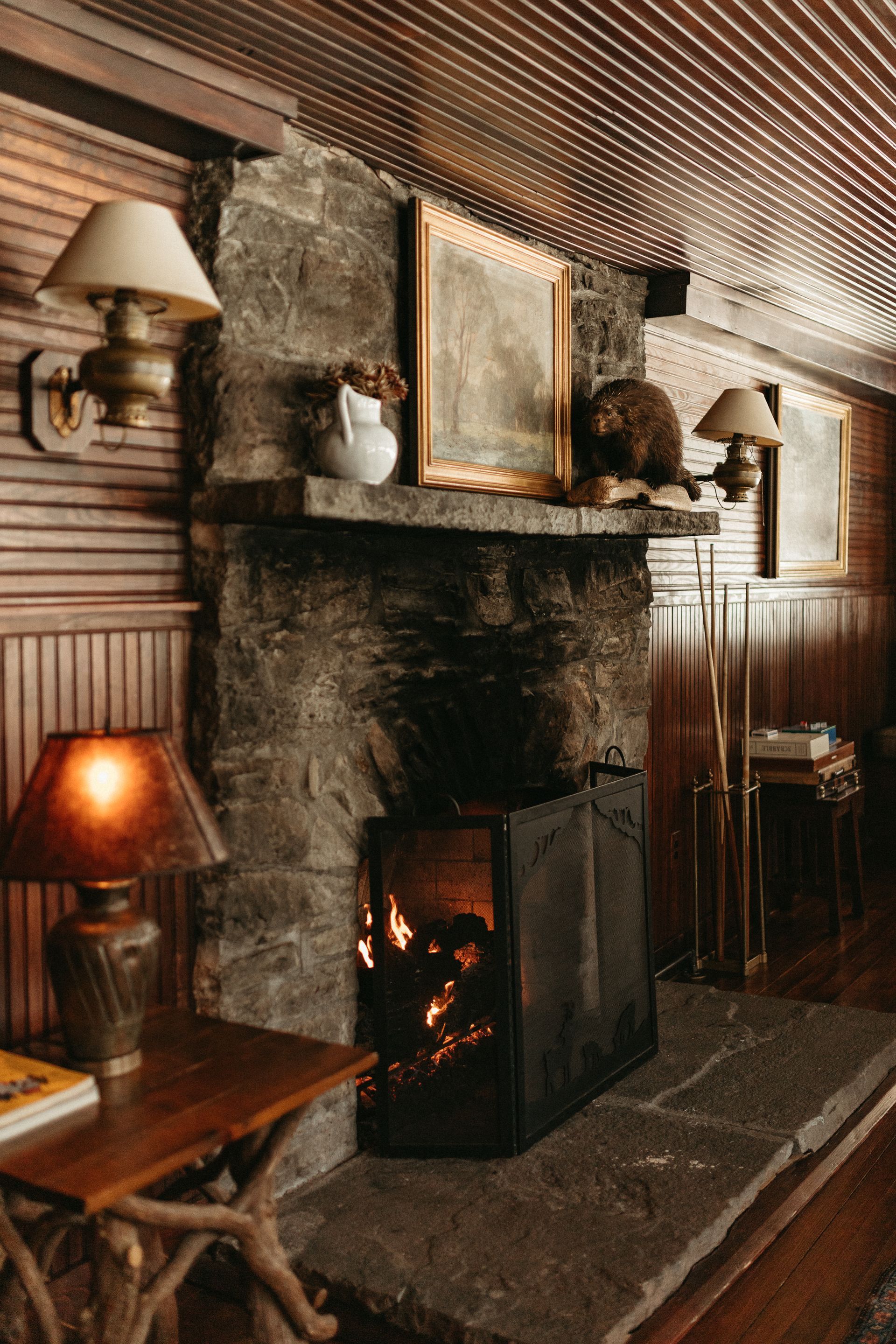 There is a fireplace in the middle of the room.