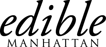 Logo reading “edible MANHATTAN” in black serif text on a white background