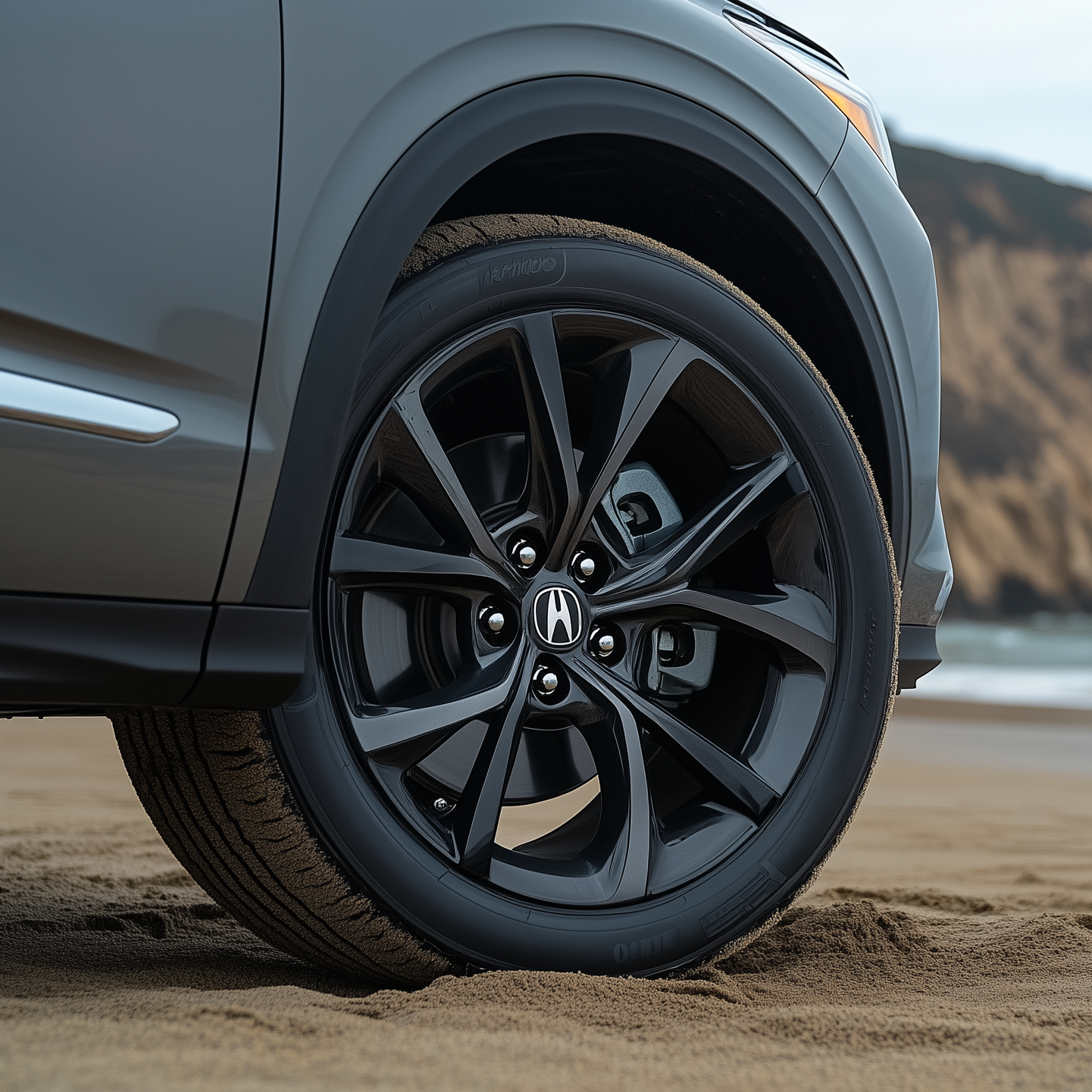 A close up of an Acura MDX wheel