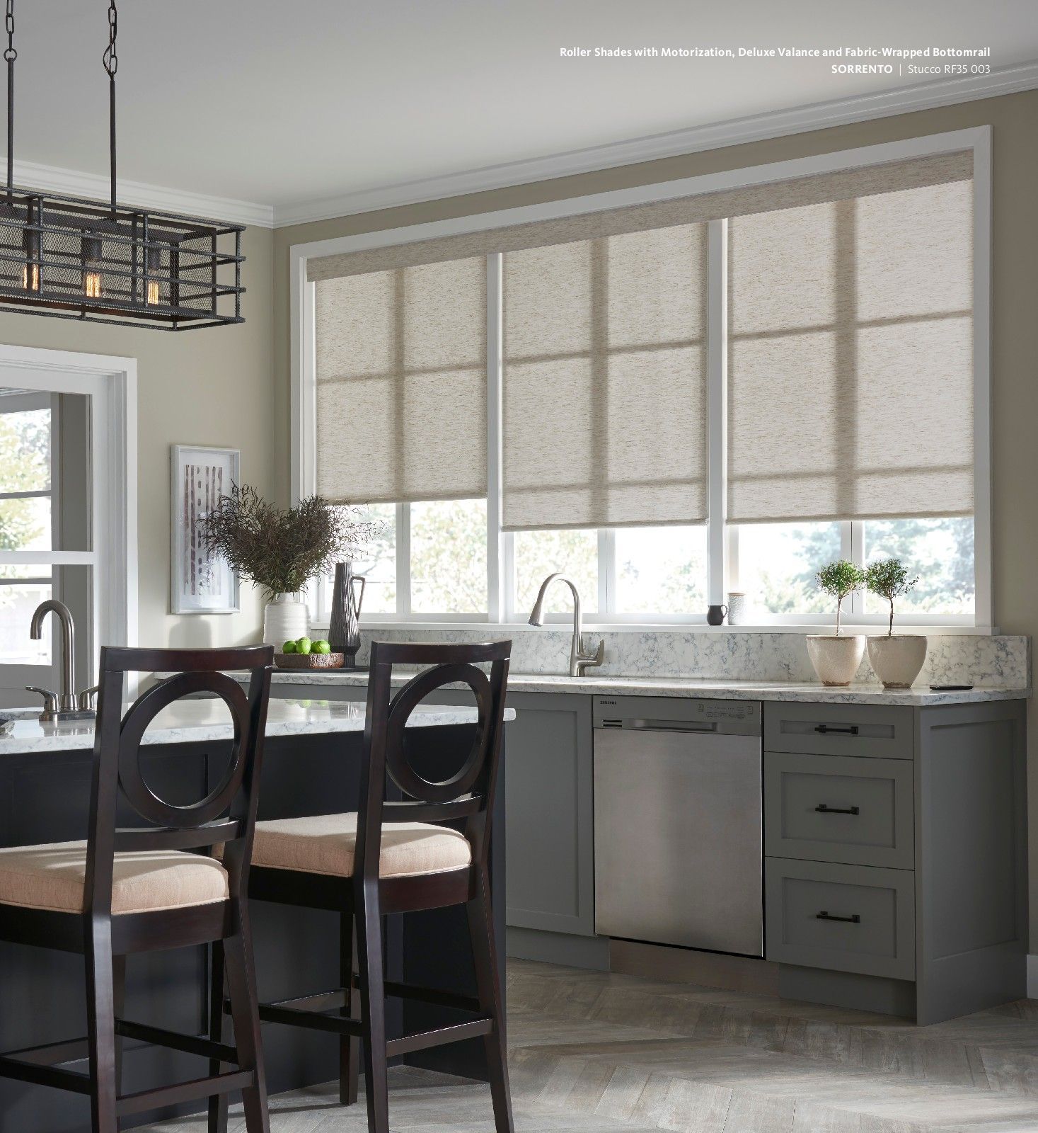 A kitchen with a large island and stools