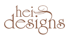 A brown logo for hei designs on a white background