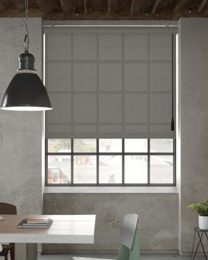 A room with a table and chairs and a window with blinds.
